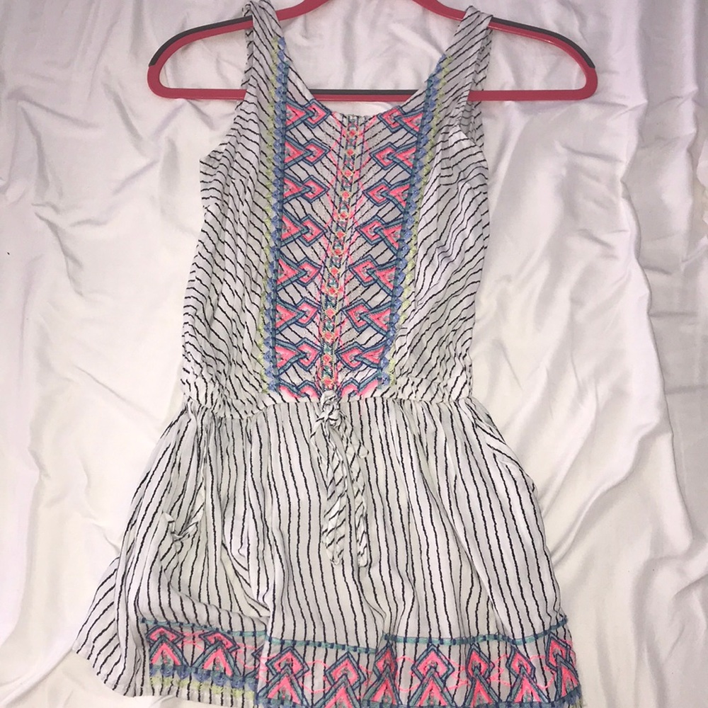 A black and white stripped romper